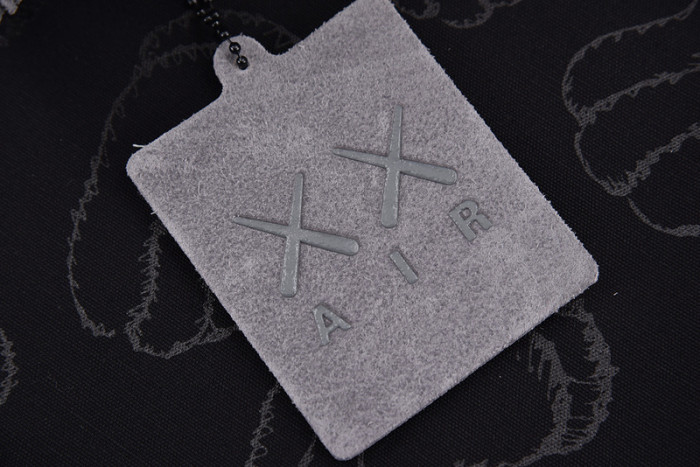 KAWS X AIR JORDAN 4 “COOL GREY” 930155-003